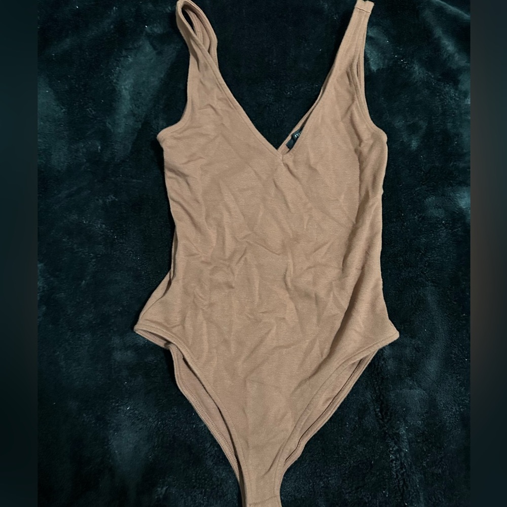 a forever 21 tan bodysuit